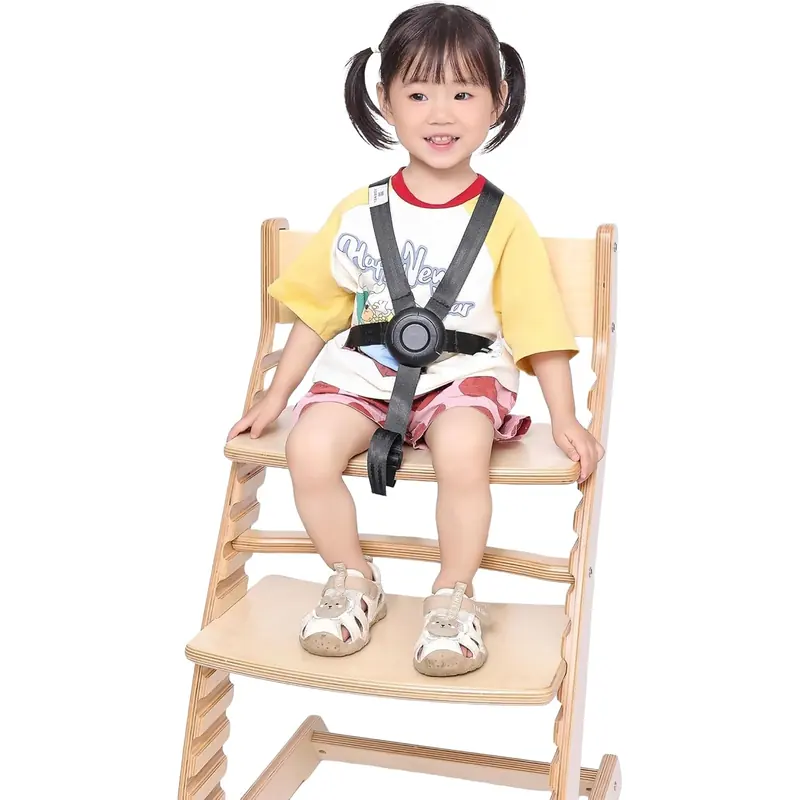 Toddler buckled in with the Fornel 5-point harness